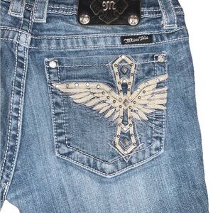 Miss Me Light Blue Jeans with Cream Winged Cross Embroidery (see photos)